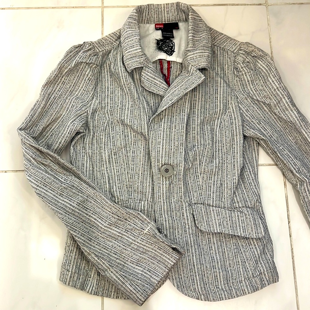 Very stylist Diesel blazer with number details on the back side
